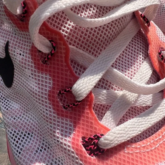 Nike Women's Pink, White and Black athletic sneakers. - Picture 8 of 17